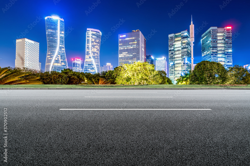 city road through modern buildings in China