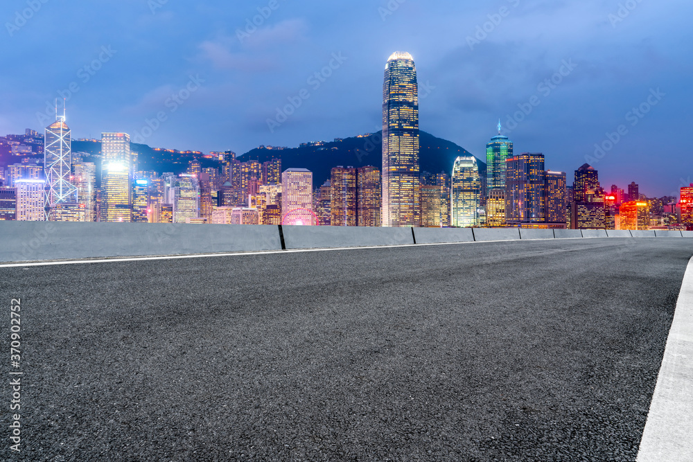 city road through modern buildings in China