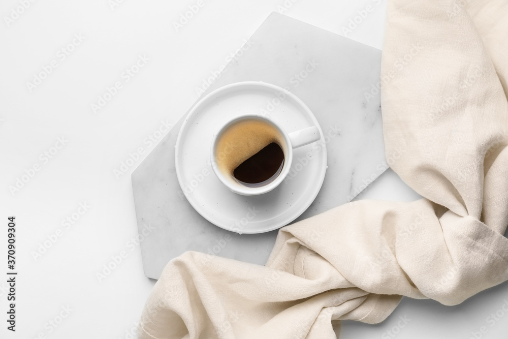 Cup of hot coffee on white background