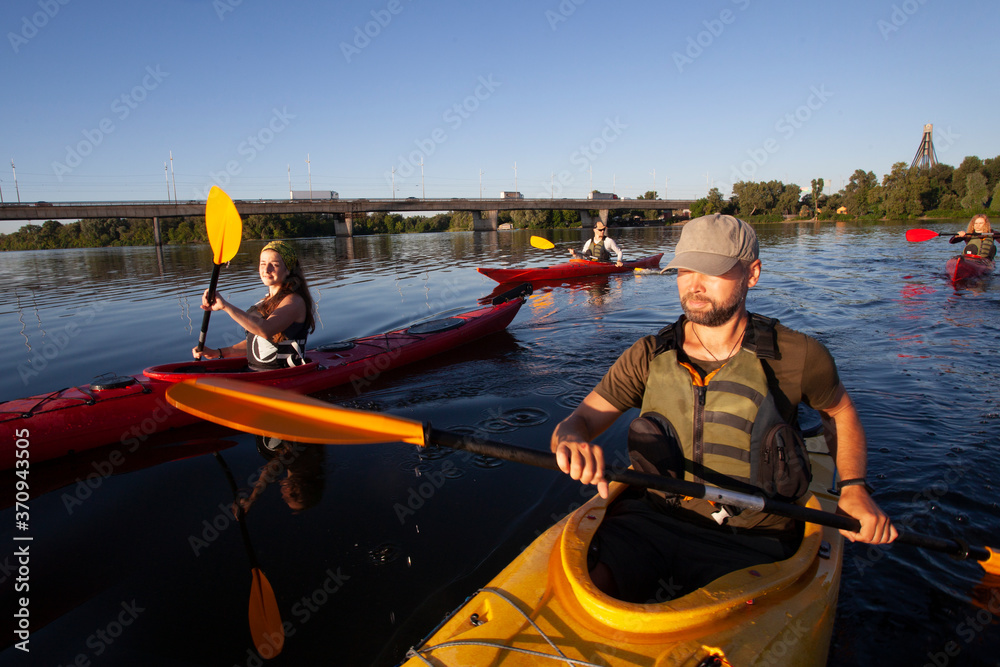 Kayaking. People paddling a kayak. Canoeing. Paddling.