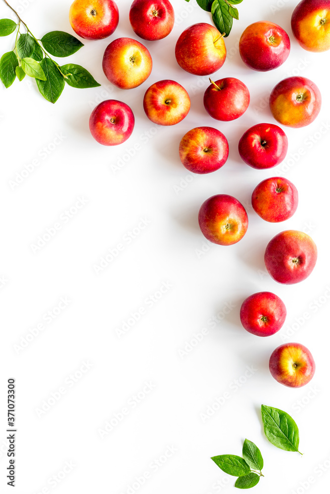 Fruit pattern of red apples on table desk top view