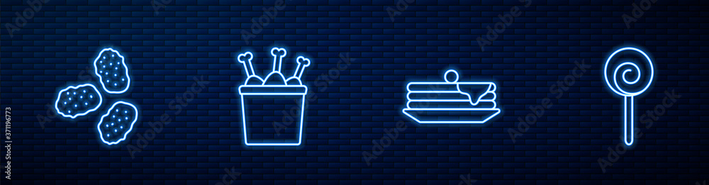 一堆煎饼、鸡块、包装盒里的腿和棒棒糖。b上闪闪发光的霓虹灯图标