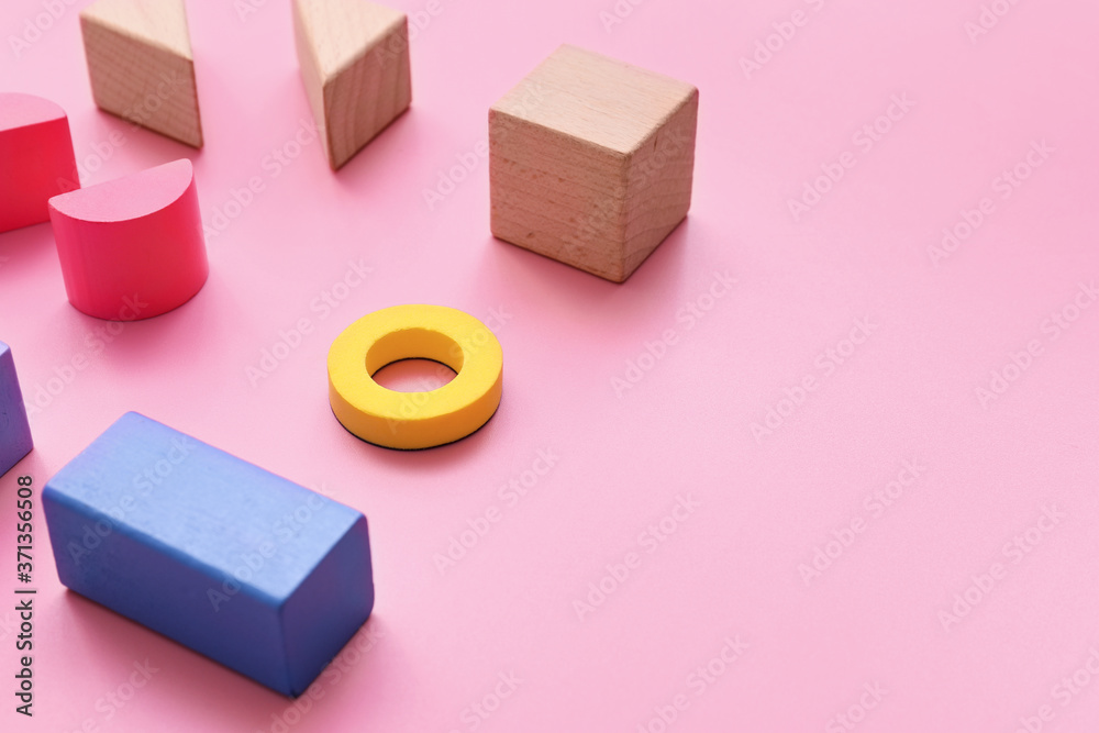 Wooden blocks on color background