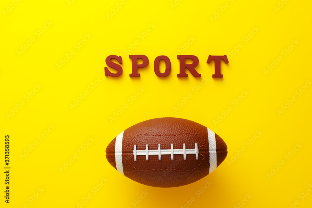 彩色背景上带有SPORT字样的橄榄球