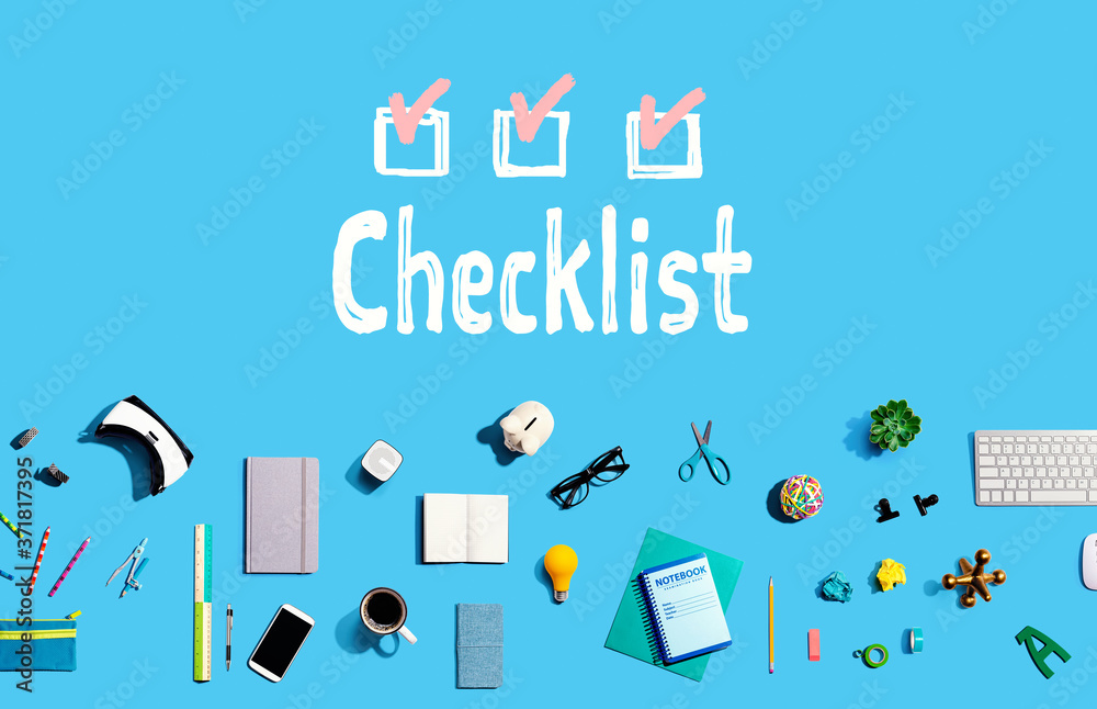 Checklist with collection of electronic gadgets and office supplies