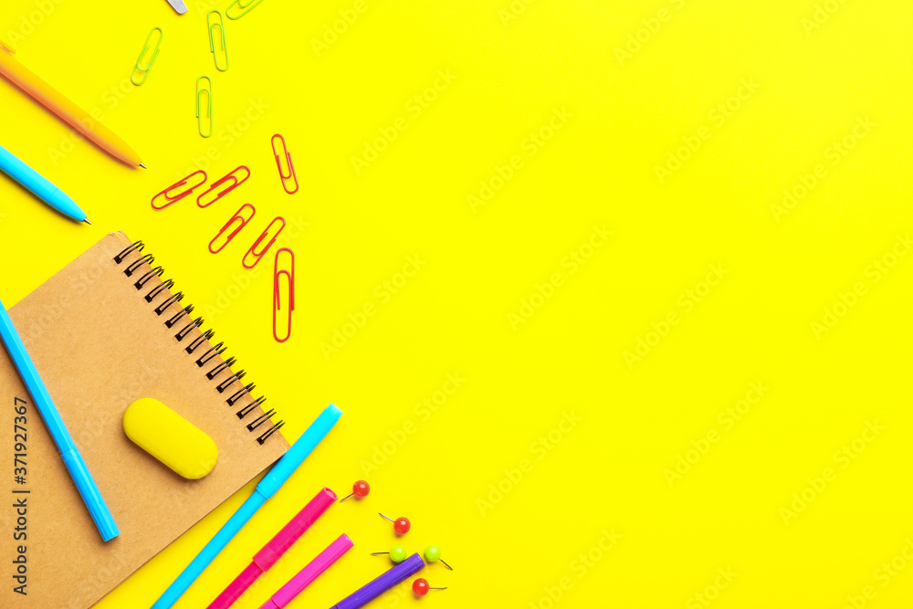 Set of school stationery on color background