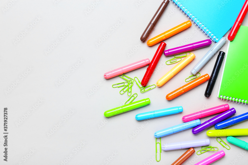 Set of school stationery on grey background