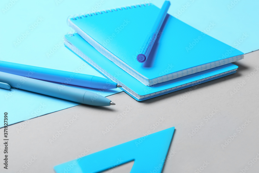 Set of school stationery on color background