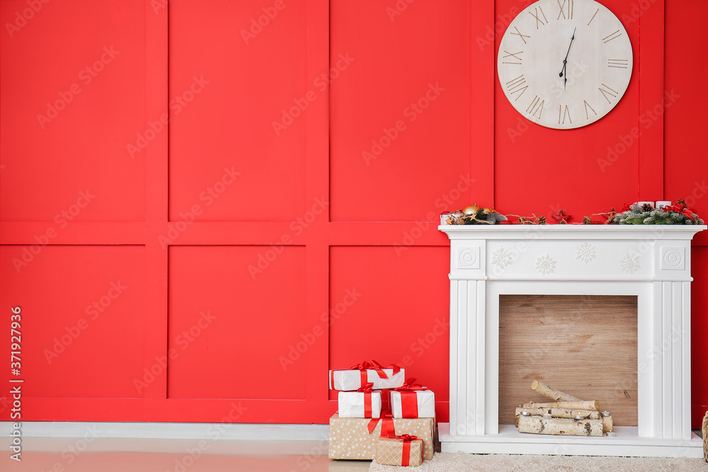 Interior of modern room with fireplace on Christmas eve