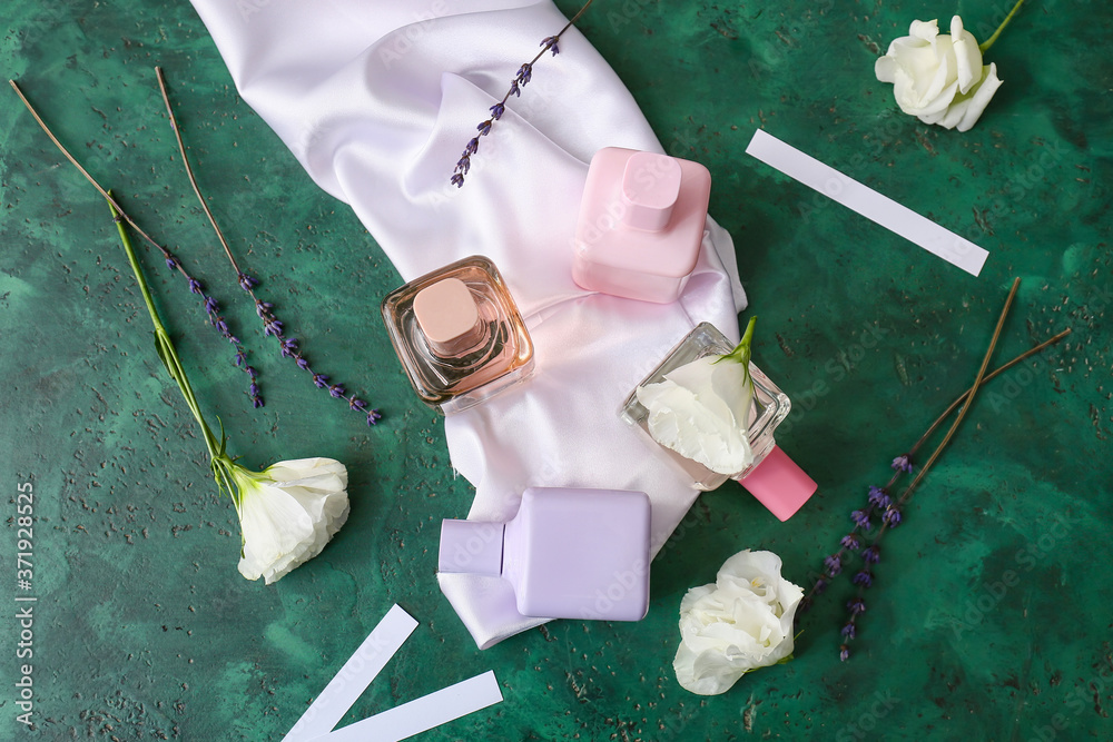 Composition with floral perfumes on table