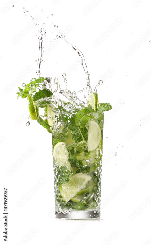 Glass of fresh mojito with splash on white background