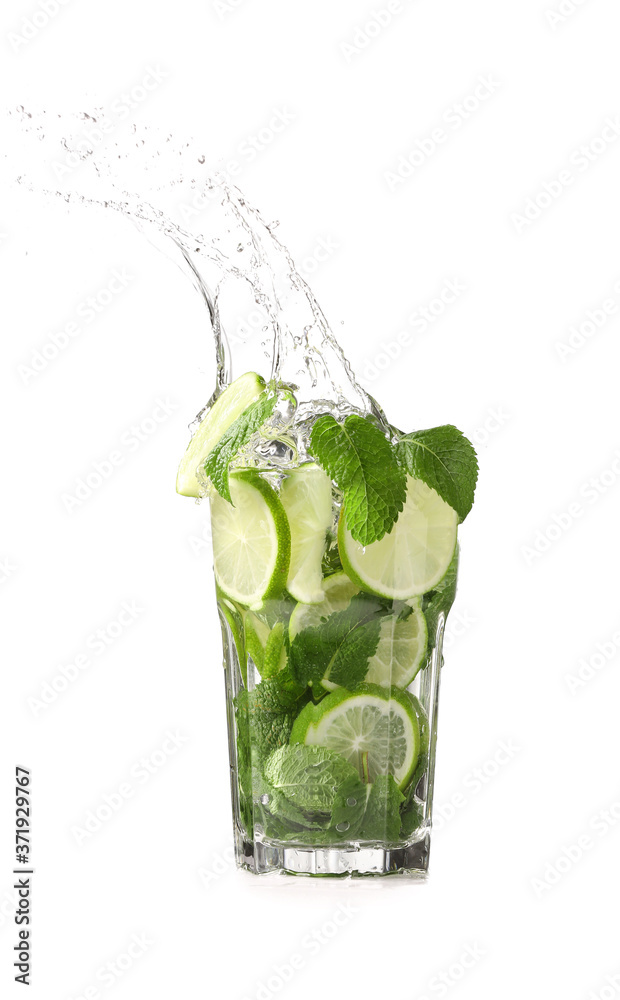 Glass of fresh mojito with splash on white background