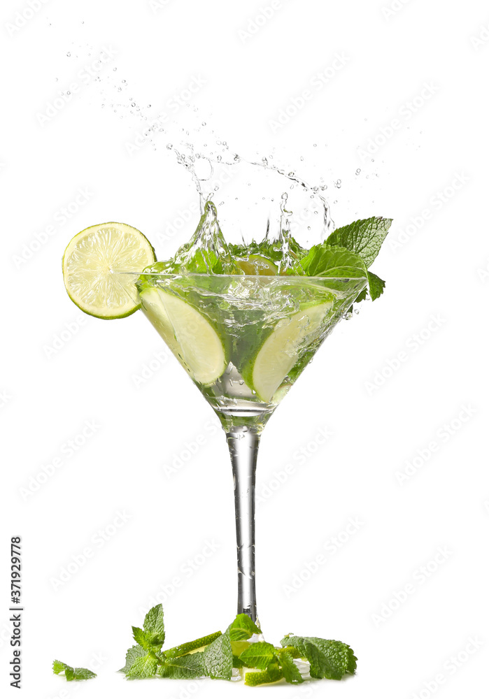 Glass of fresh mojito with splash on white background