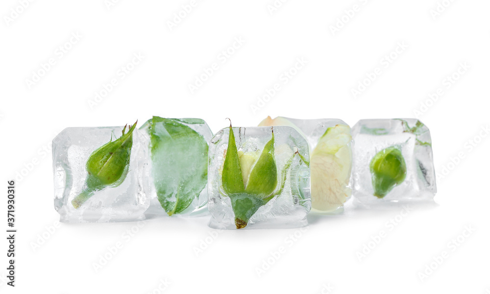 Frozen flowers in ice on white background