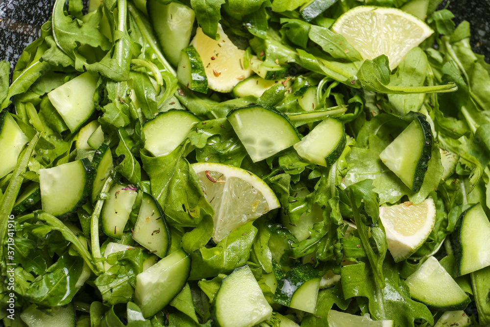 Tasty cucumber salad as background