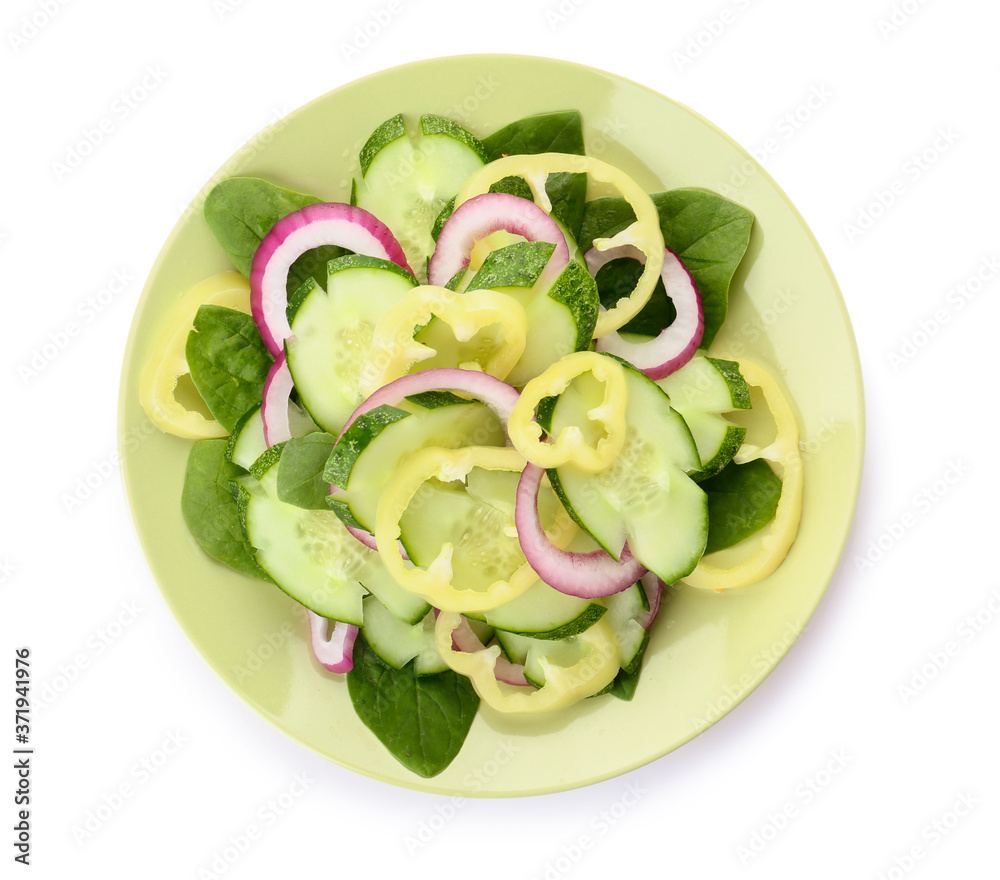 Plate with tasty cucumber salad on white background