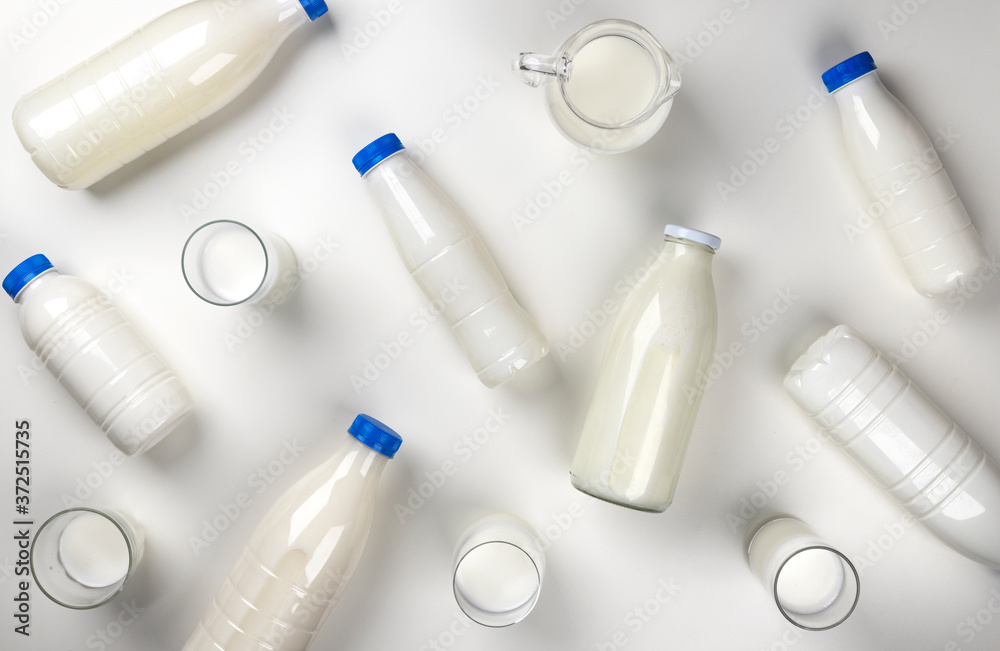 Dairy products packaging on white background, top view