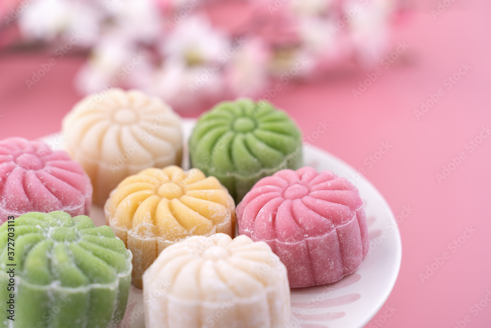 Colorful snow skin moon cake, sweet snowy mooncake, traditional savory dessert for Mid-Autumn Festiv