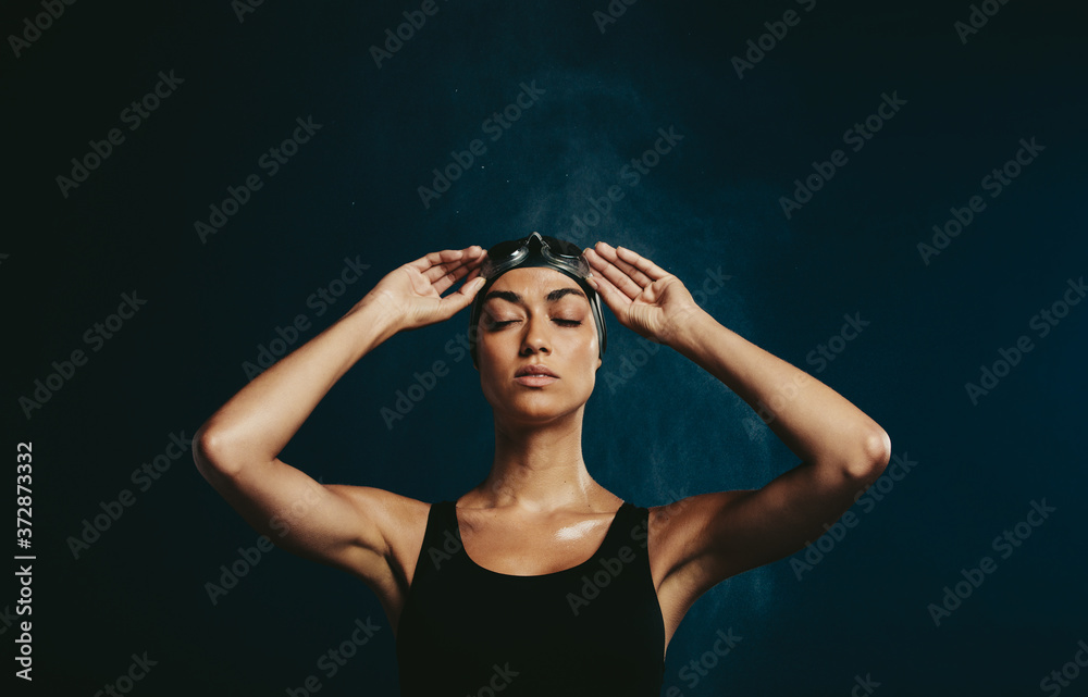 Female swimmer in black costume