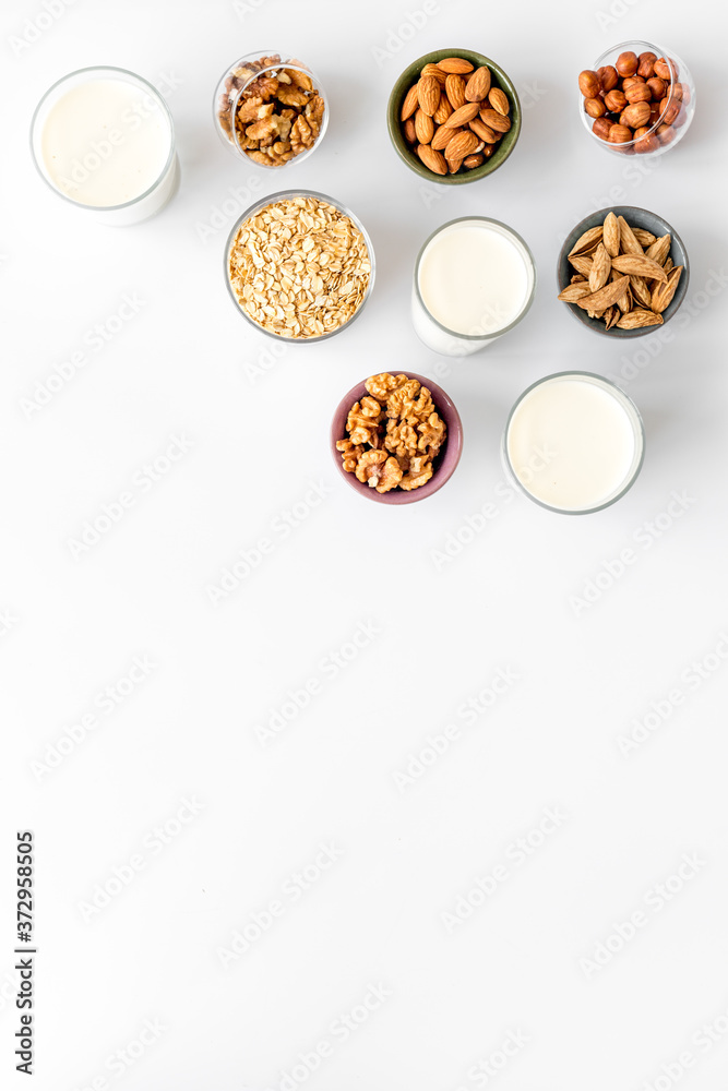 Vegan non-diary milk. Alternative types of milk with nuts and oat