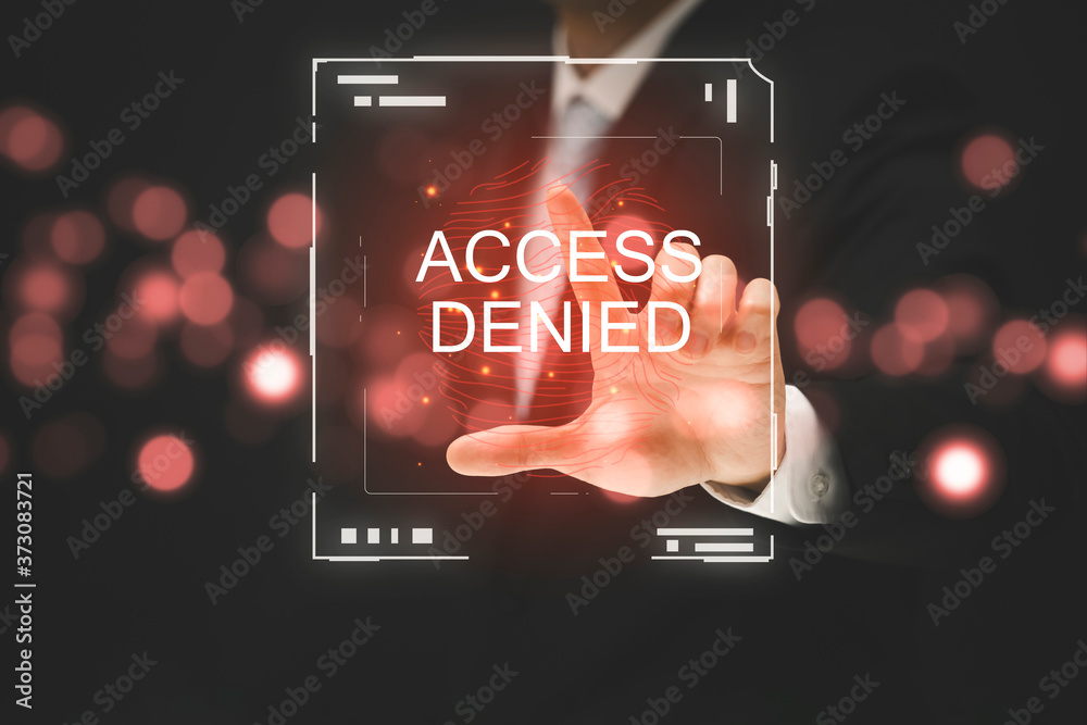 商人用手指触摸bla上通道图中的指纹上的单词ACCESS DENIED