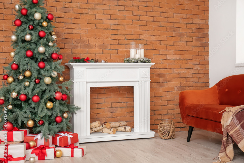 Interior of modern room with fireplace on Christmas eve