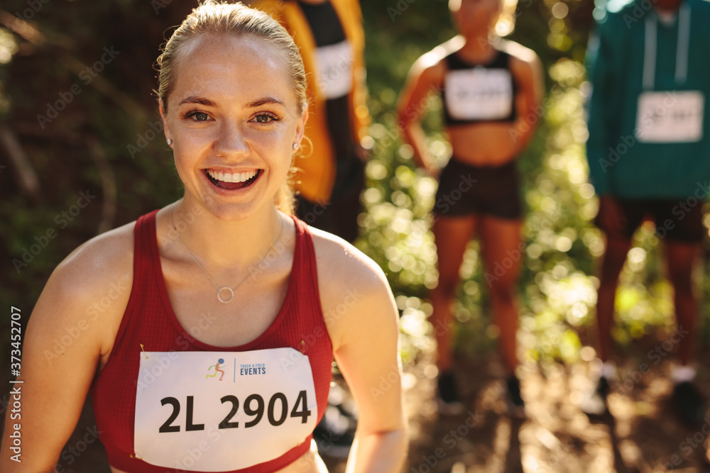 Smiling woman marathon runner