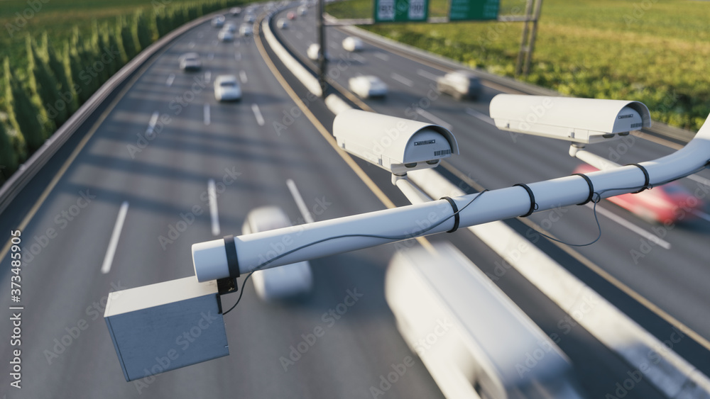  Speed camera monitoring busy traffic road. The cameras speed control on the road