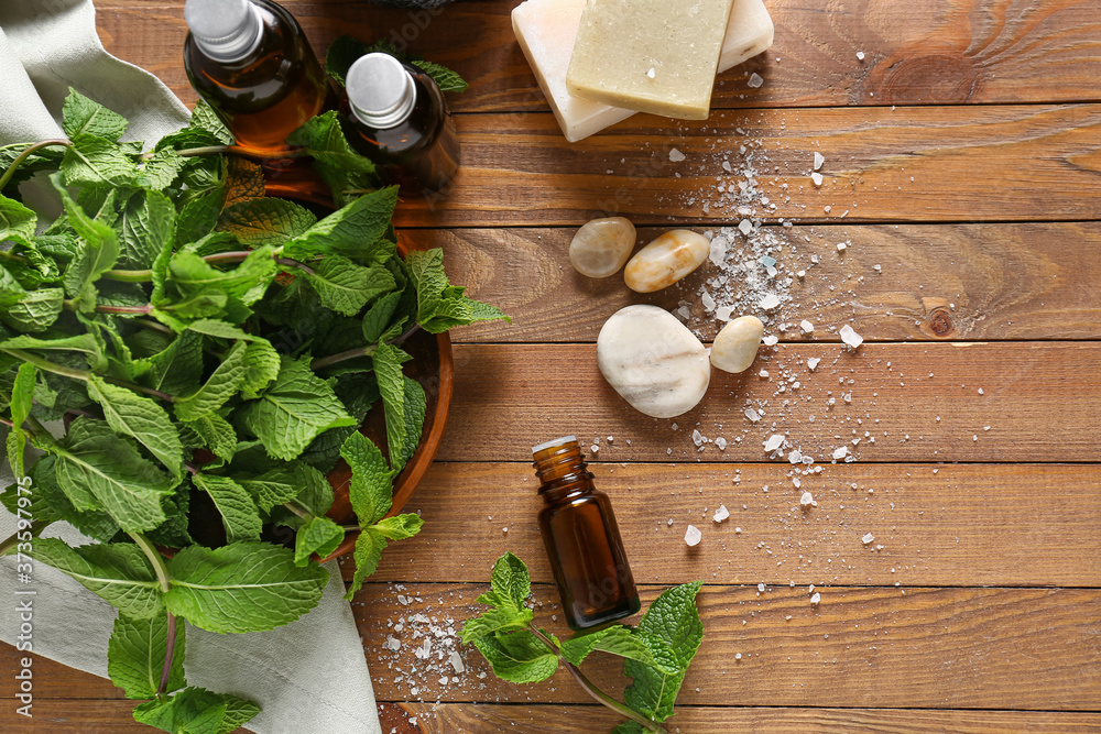 Spa composition with mint on wooden table