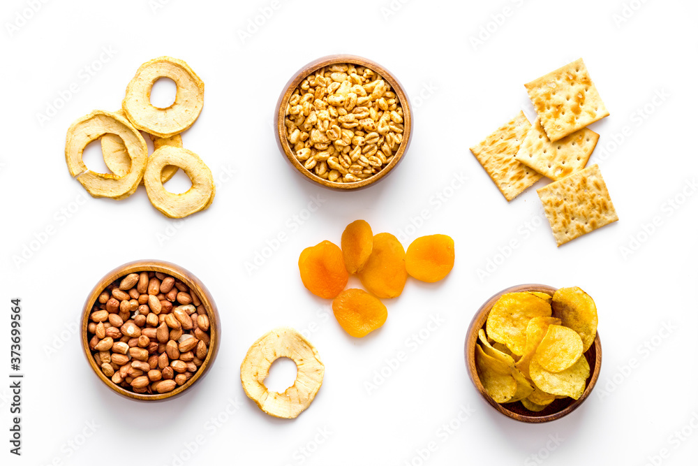 Pattern of snacks mix top view - nuts and dried fruits