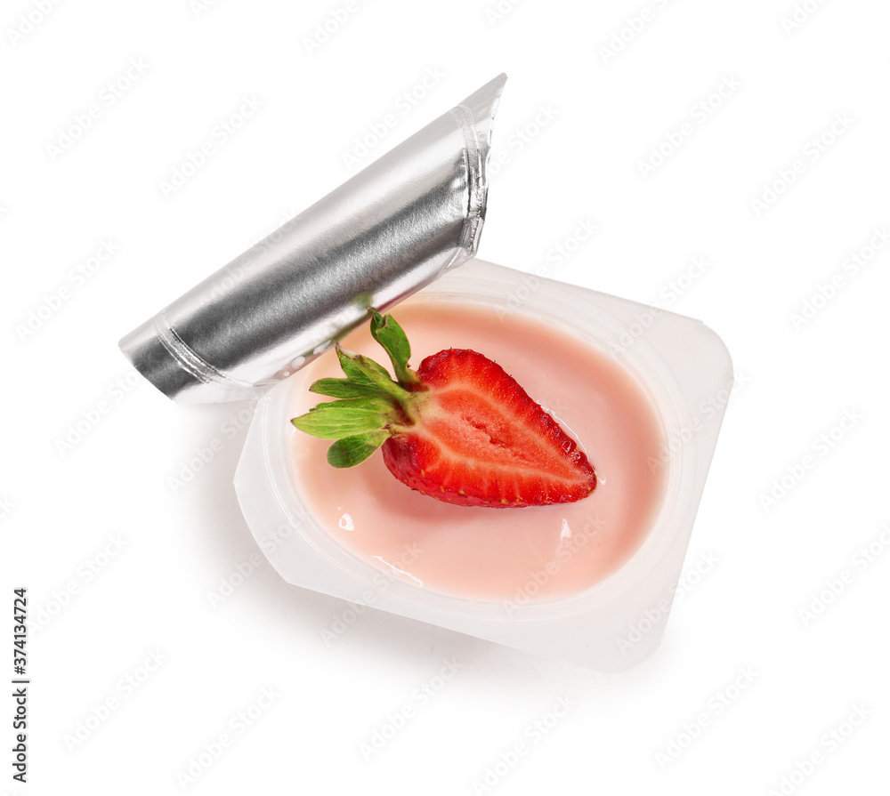 Plastic cup of strawberry yogurt on white background