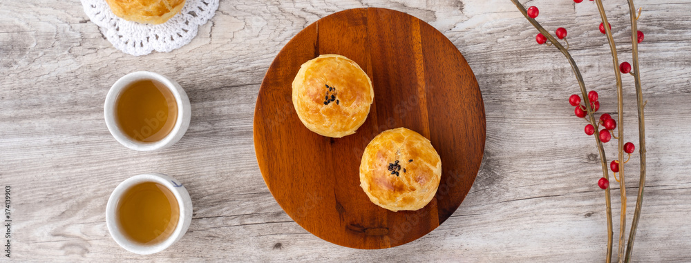 Moon cake yolk pastry, mooncake for Mid-Autumn Festival holiday, top view design concept on bright w