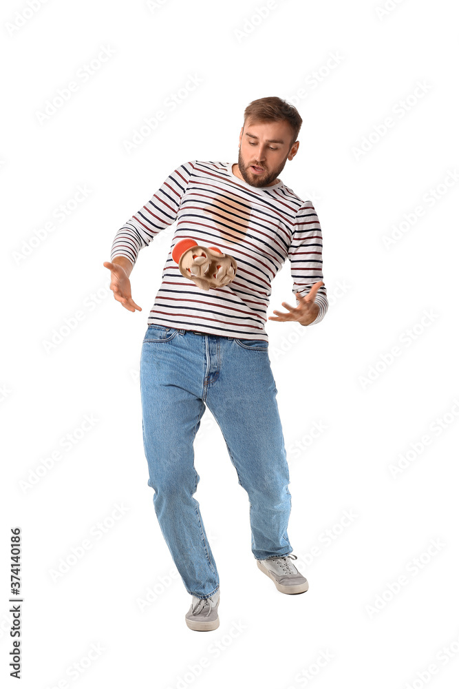 Stressed young man dropping cups of coffee on white background