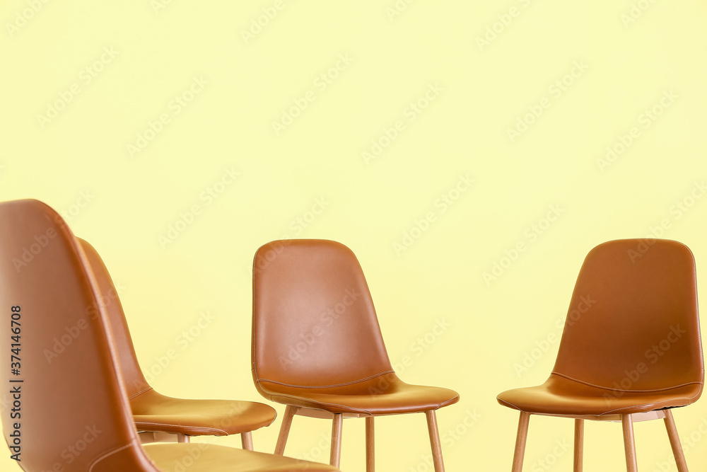 Empty chairs prepared for group therapy in psychologists office