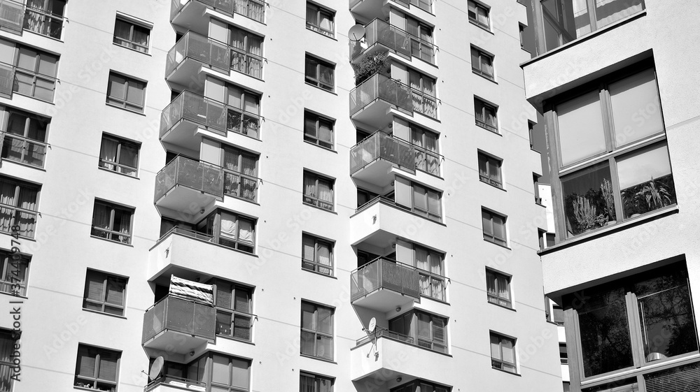 Detail of modern residential flat apartment building exterior. Fragment of new luxury house and home