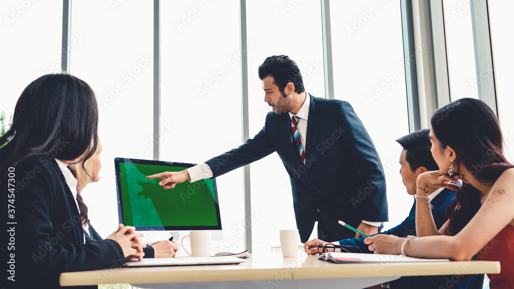 Business people in the conference room with green screen chroma key TV or computer on the office tab