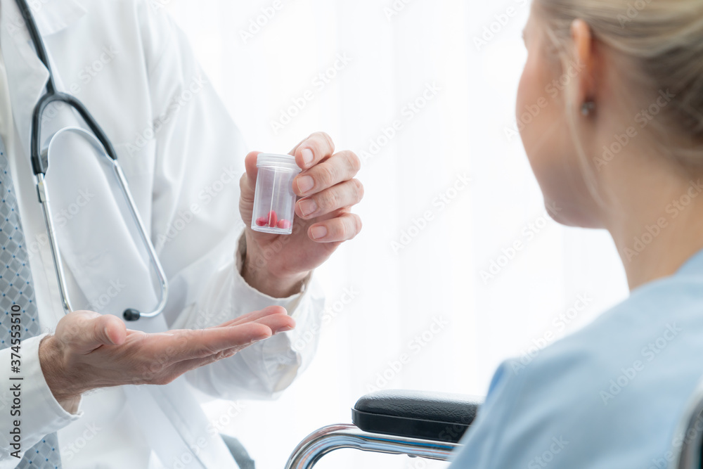 Doctor in professional uniform examining patient at hospital or medical clinic. Health care , medica