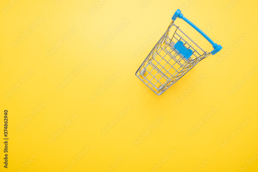 Shopping cart consumer shopping concept illustration on yellow background