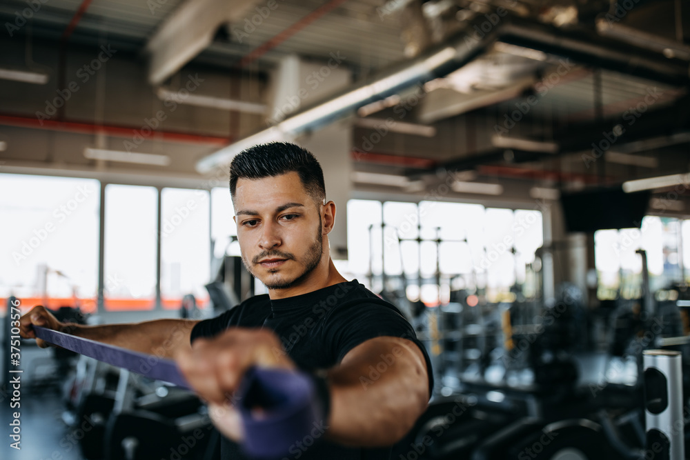 Focused man, workout time.