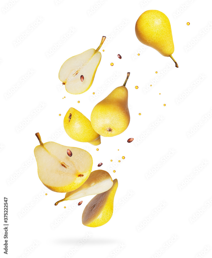 Whole and sliced ​​fresh pears in the air on a white background