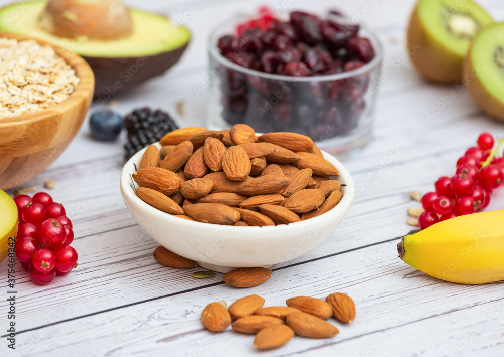 Group Fruits Breakfast with bread Whole grains and nuts, yogurt mix with Cherry , banana, avocado in