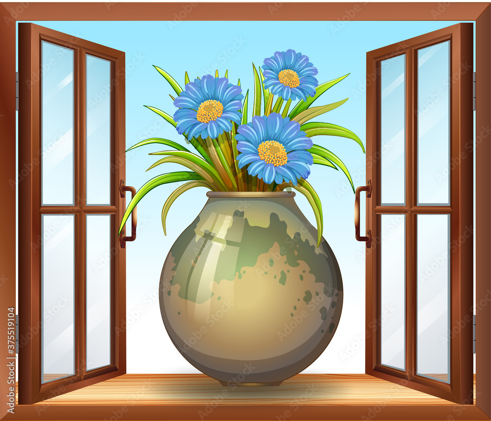 Flower in vase near window