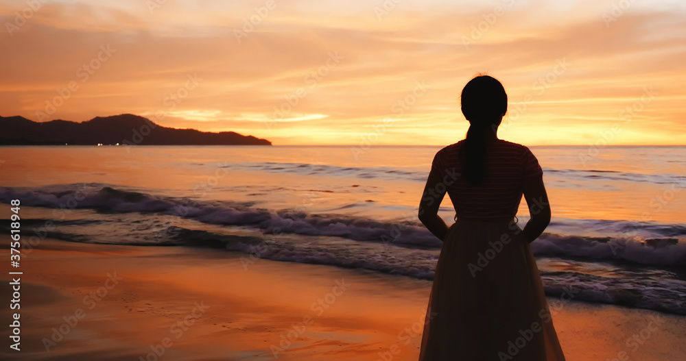 asian woman stand on beach