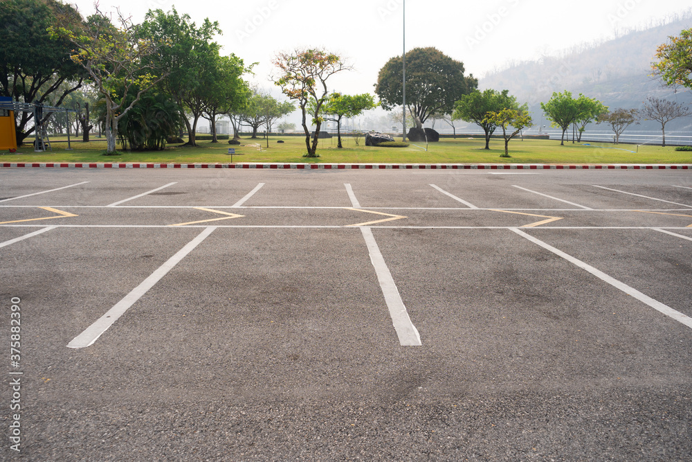 Empty parking lot parking lane outdoor in the park.