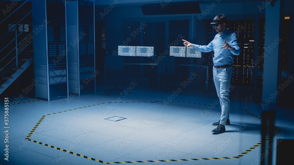 In 3D Content Creating Laboratory Engineer Wearing Professional Virtual Reality Headset Works and Ge