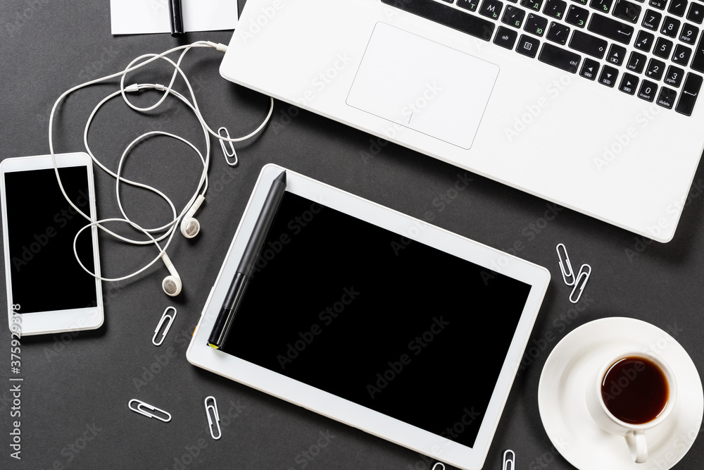 Top view of workplace with digital devices