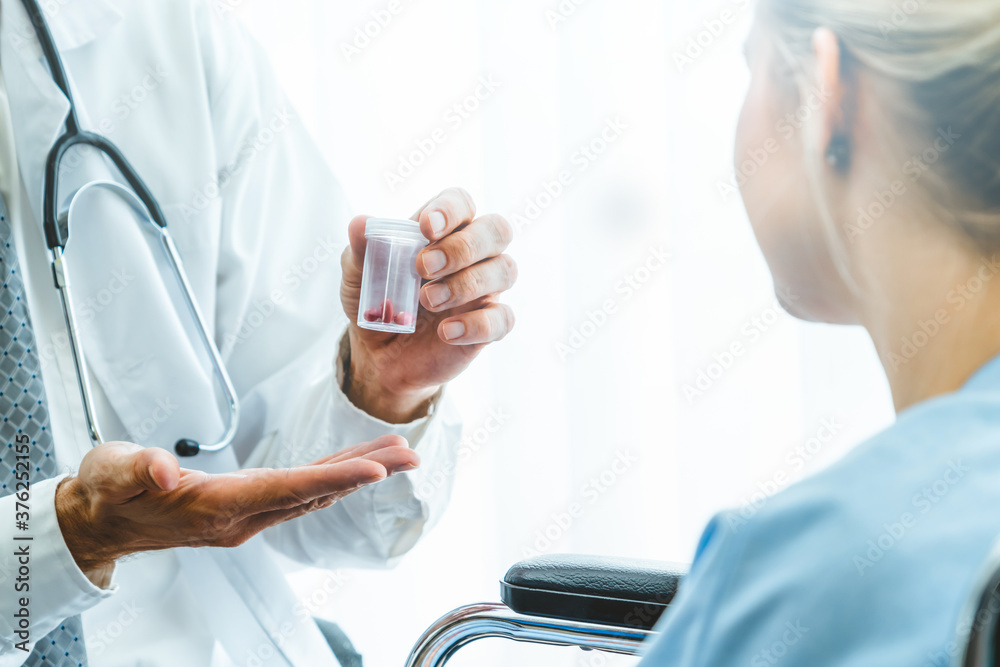 Doctor in professional uniform examining patient at hospital or medical clinic. Health care , medica