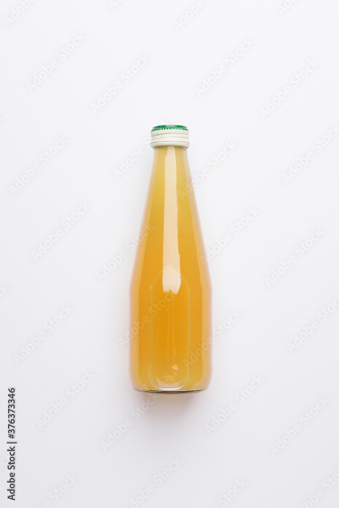 Bottle of juice on white background