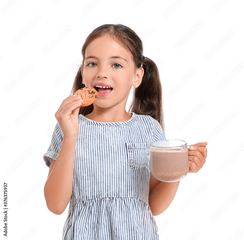 Little girl with glass of chocolate milk and cookie on white background