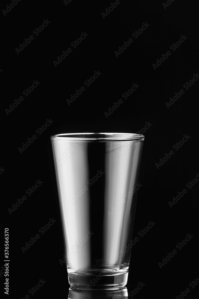 Empty glass on dark background